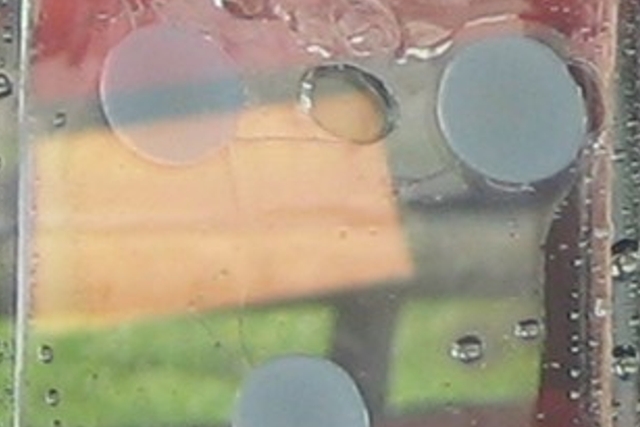 Complete wetting of a TiO&lt;sub&gt;2&lt;/sub&gt;-particle based layer with water after treatment with UV&lt;sub&gt;A&lt;/sub&gt;-light.